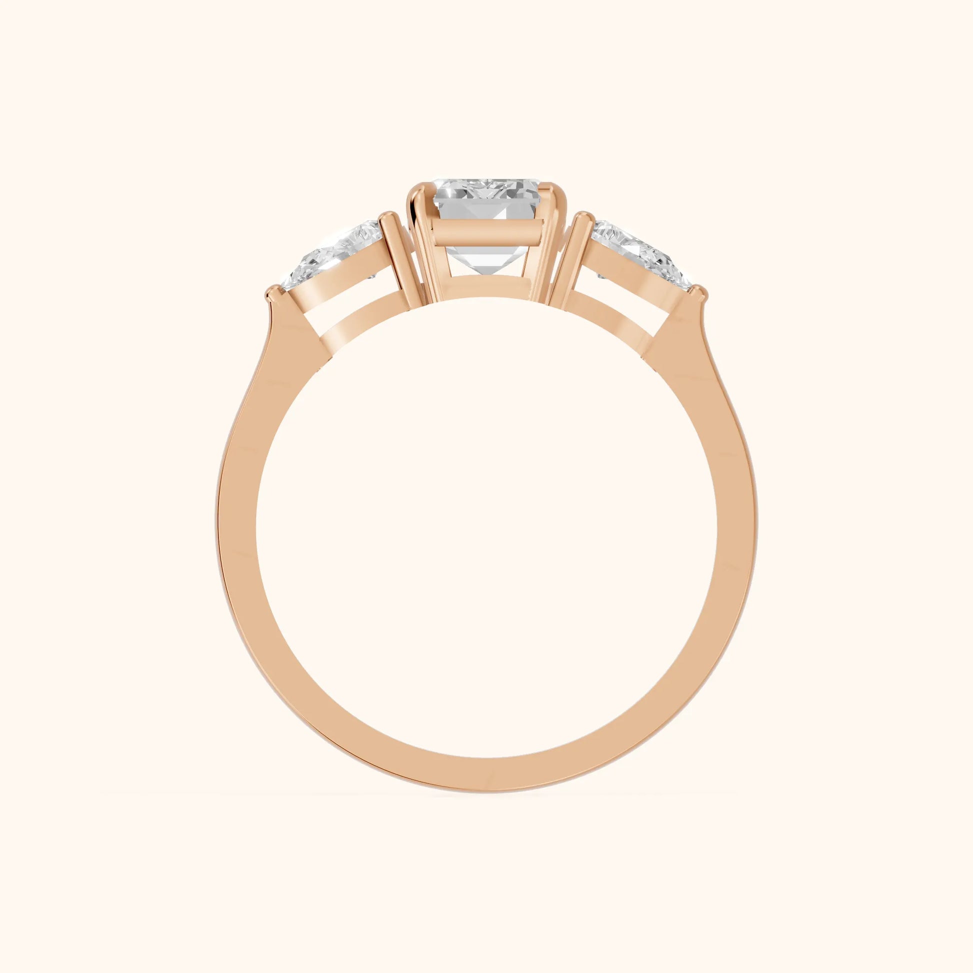 Grace Three Stone Emerald Diamond Engagement Ring in Rose Gold - FingerView