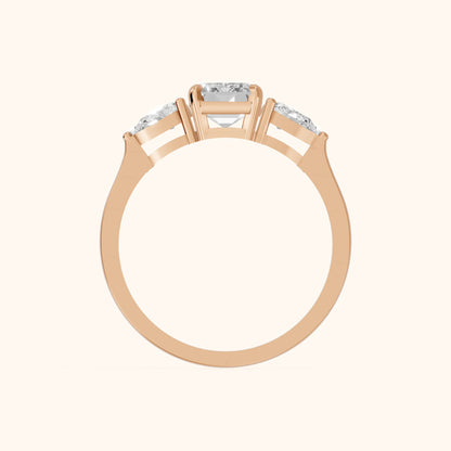 Grace Three Stone Emerald Diamond Engagement Ring in Rose Gold - FingerView