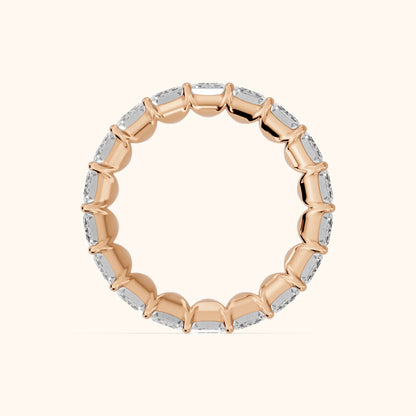 Zaya Shared Prong Emerald Diamond Eternity Band in Rose Gold - FingerView