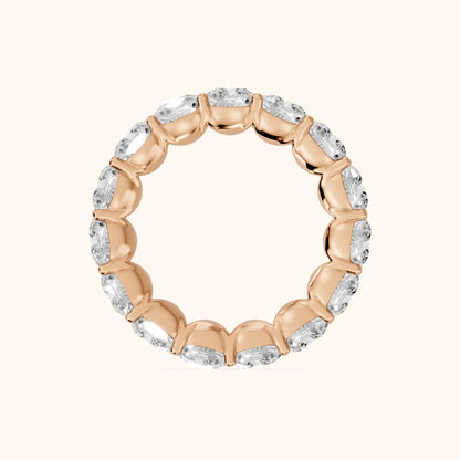 Vida Shared Prong Cushion Diamond Eternity Band in Rose Gold - FingerView