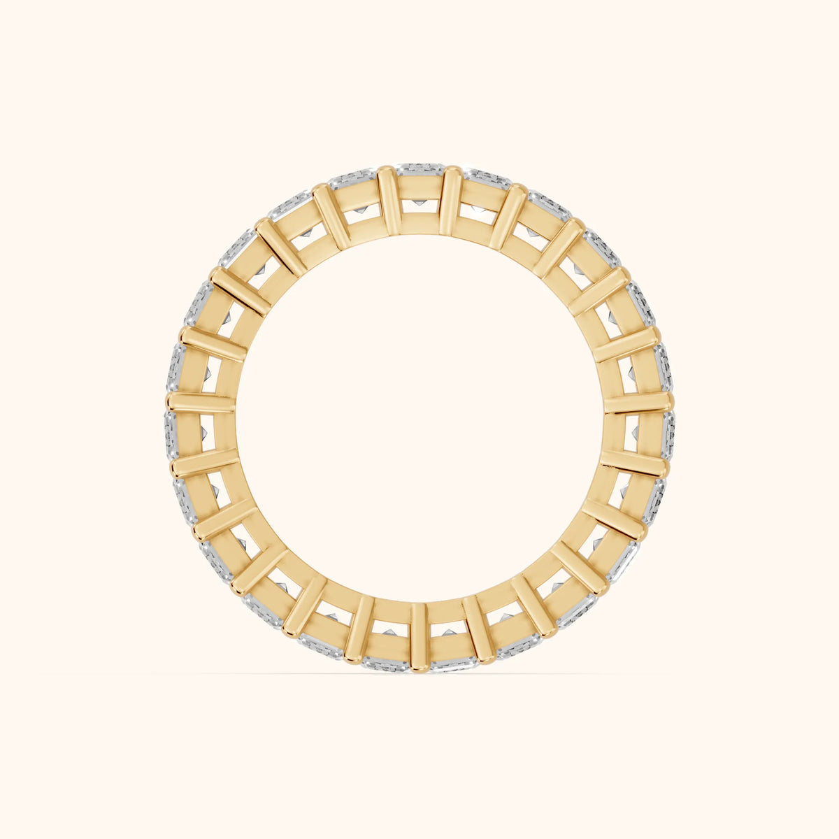 Callia Shared Prong Emerald Diamond Eternity Band in Yellow Gold - FingerView