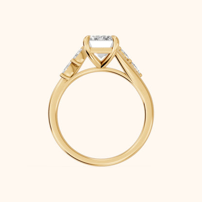 Flora Twist Side Stone Emerald Diamond Engagement Ring in Yellow Gold - FingerView