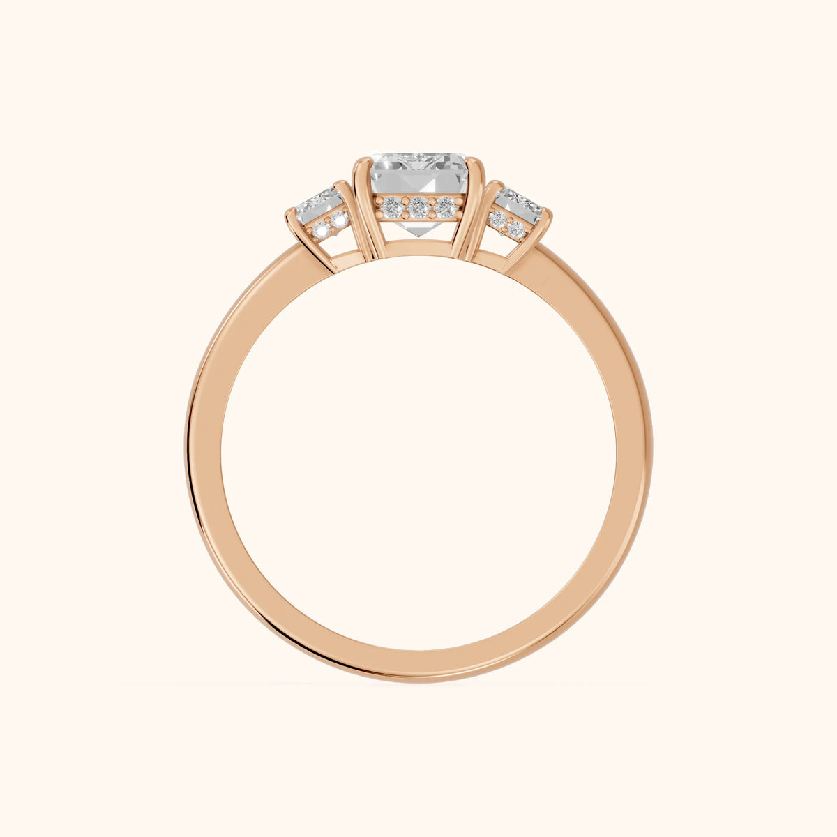 Marian Three-Stone Hidden Halo Emerald Diamond Engagement Ring in Rose Gold - FingerView.webp