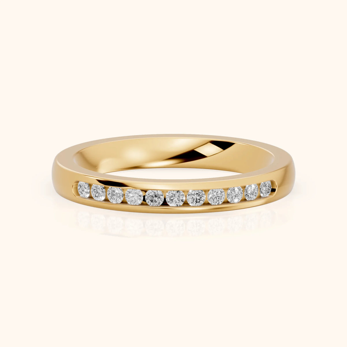 Coralie Channel Set Round Diamond Wedding Band in Yellow Gold - FrontView