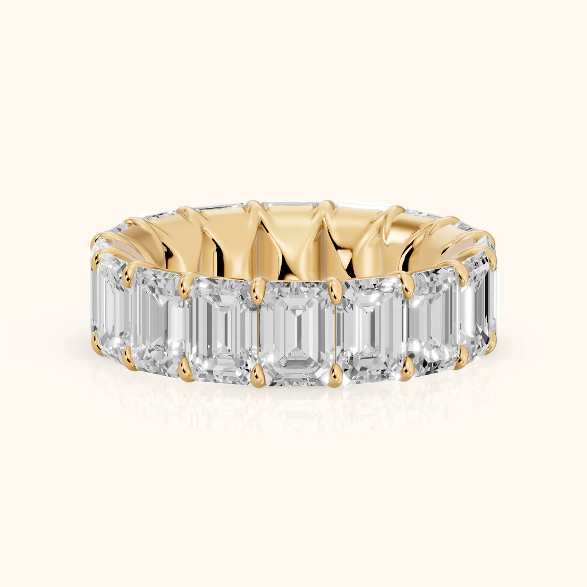 Zia Shared Prong Emerald Diamond Eternity Band in Yellow Gold - FrontView