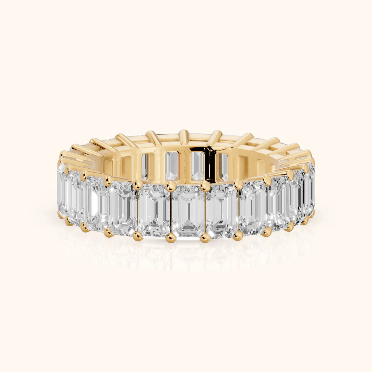 Callia Shared Prong Emerald Diamond Eternity Band in Yellow Gold - FrontView