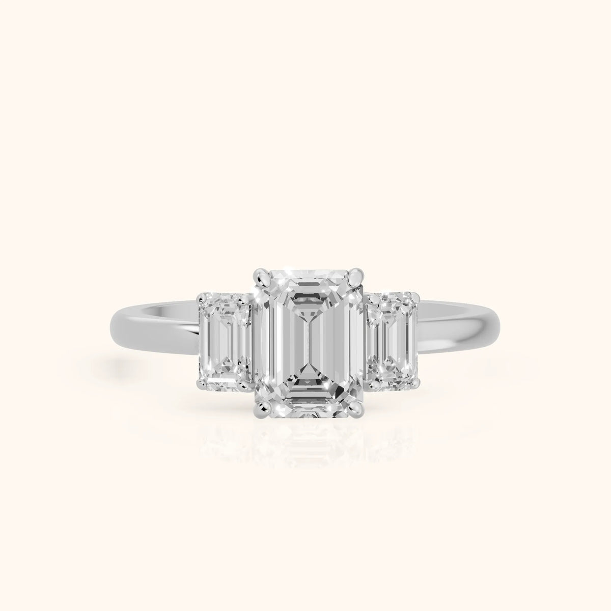 Marian Three-Stone Hidden Halo Emerald Diamond Engagement Ring in Silver - FrontView.webp