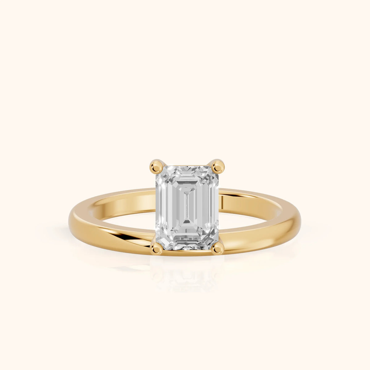 Maisie Four Prong Solitaire Emerald Diamond Engagement Ring in Yellow Gold - FrontView.webp