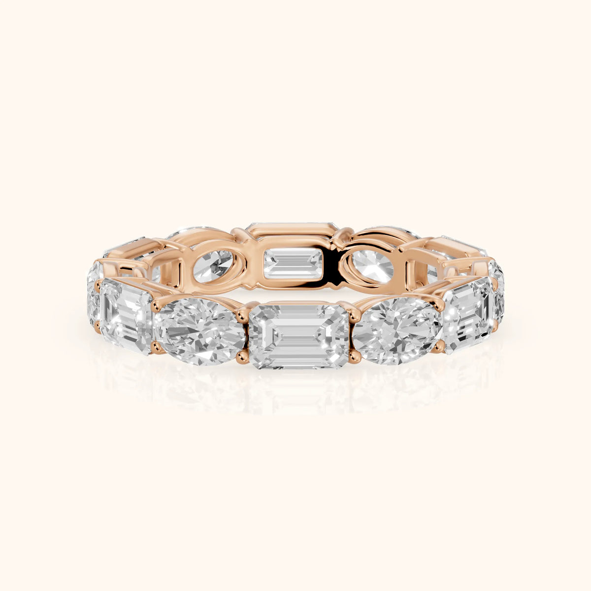 Hema Shared Prong Emerald & Oval Diamond Eternity Band in Rose Gold - FrontView