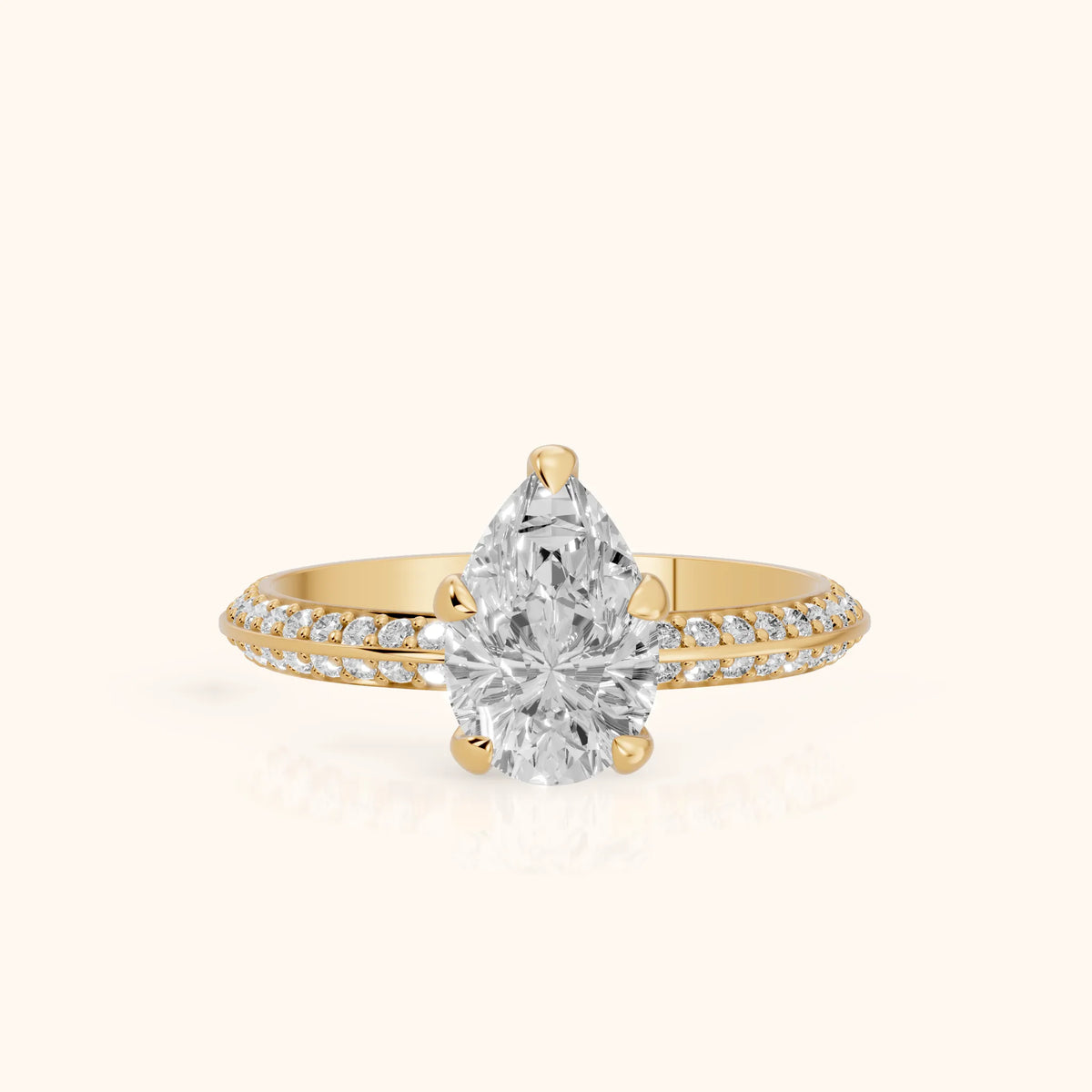 Meredith Knife Edge Pavé Pear Diamond Engagement Ring in Yellow Gold - FrontView.webp