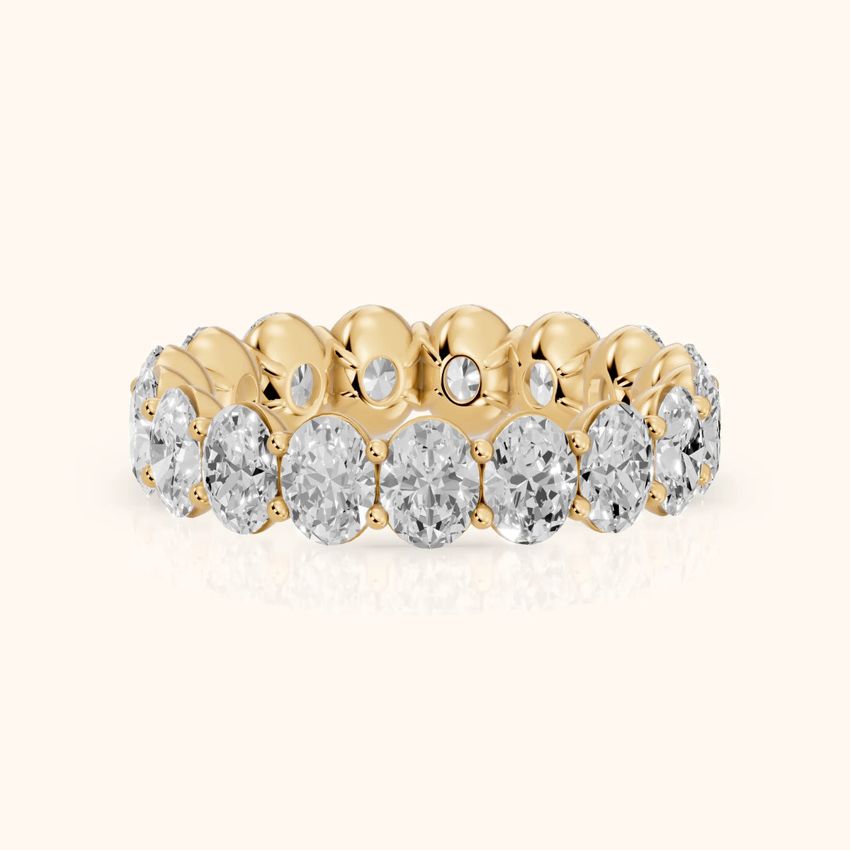Neha Shared Prong Oval Diamond Eternity Band in Yellow Gold - FrontView