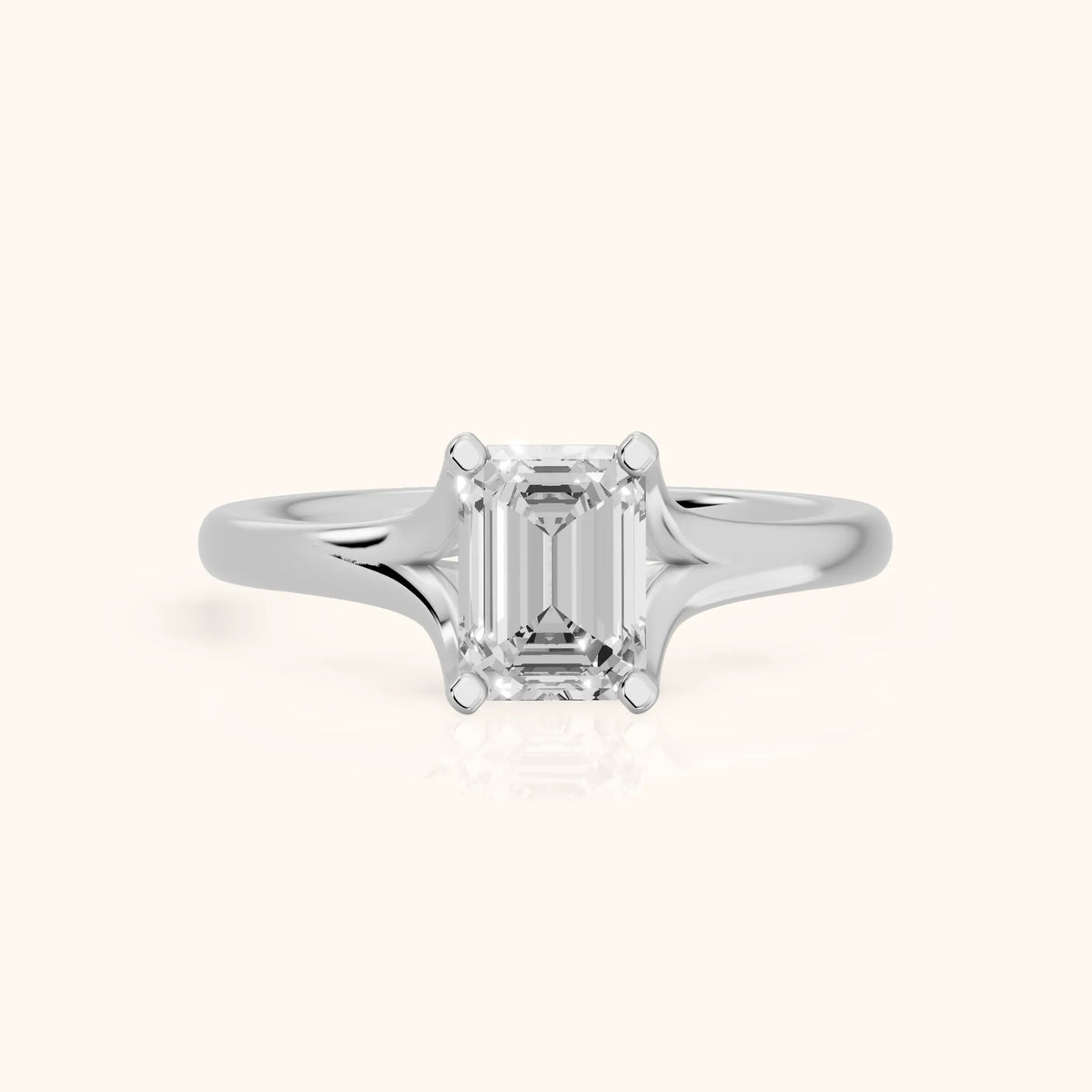 Nell Split Shank Solitaire Emerald Diamond Engagement Ring in White Gold - FrontView.webp