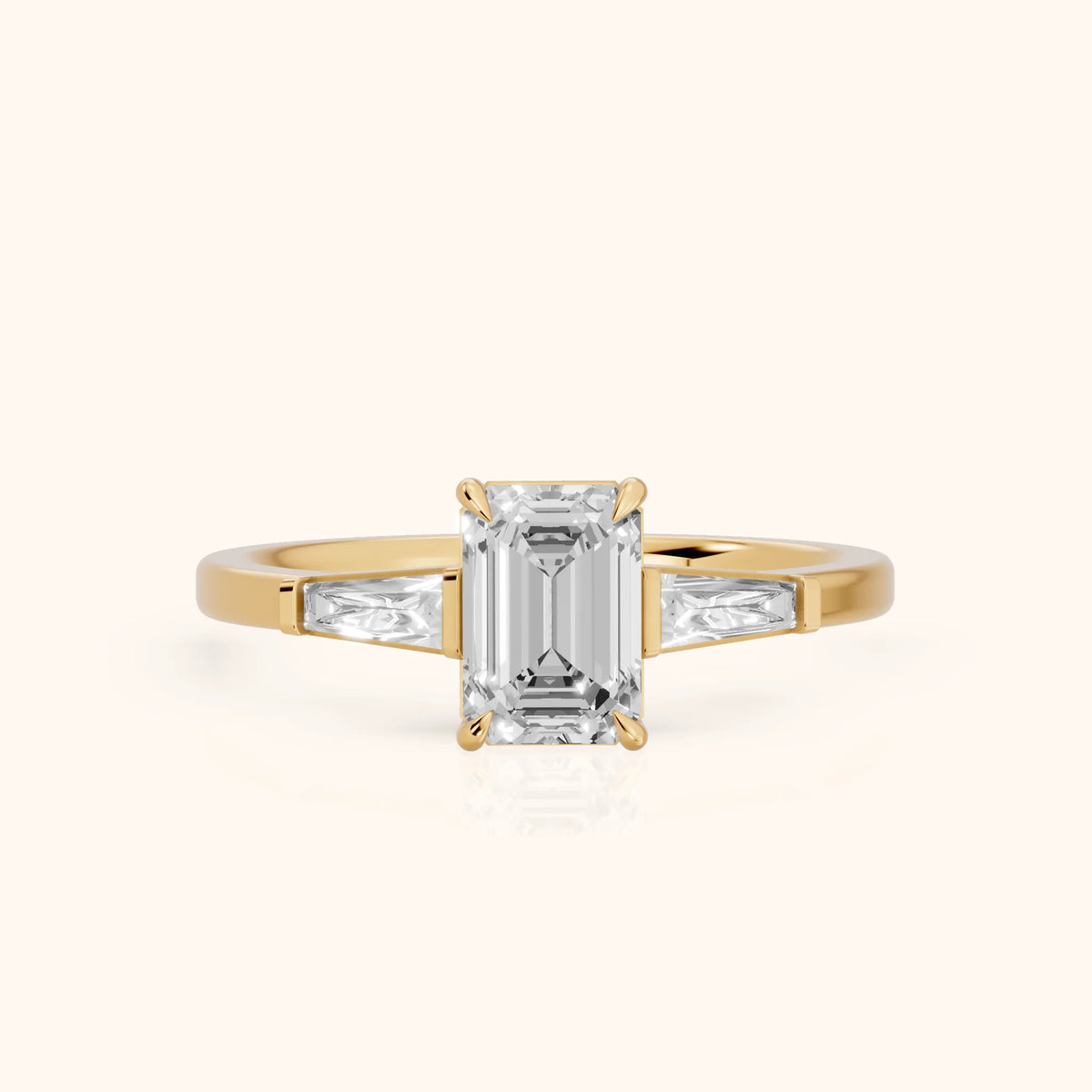 Winnie Three-Stone Emerald Diamond Engagement Ring in Yellow Gold - FrontView.webp
