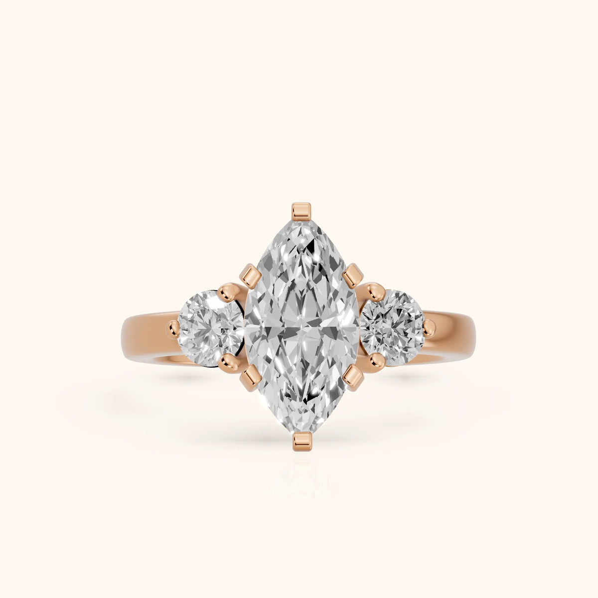 Freesia Three-Stone Marquise Diamond Engagement Ring in Rose Gold - FrontView.webp