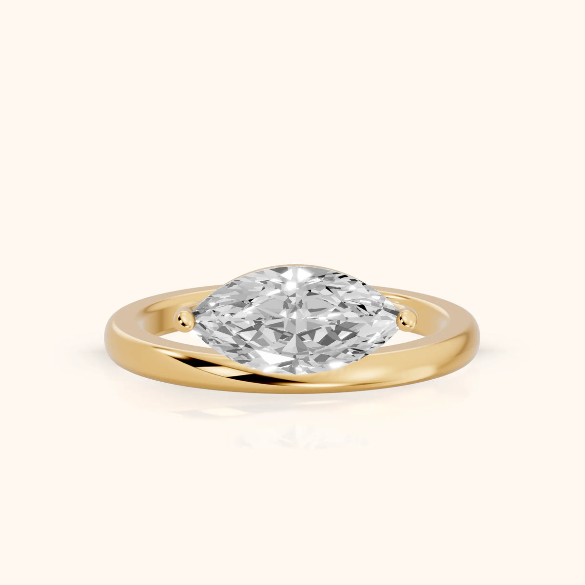 Maisie Four Prong Solitaire Marquise Diamond Engagement Ring in Yellow Gold - FrontView.webp