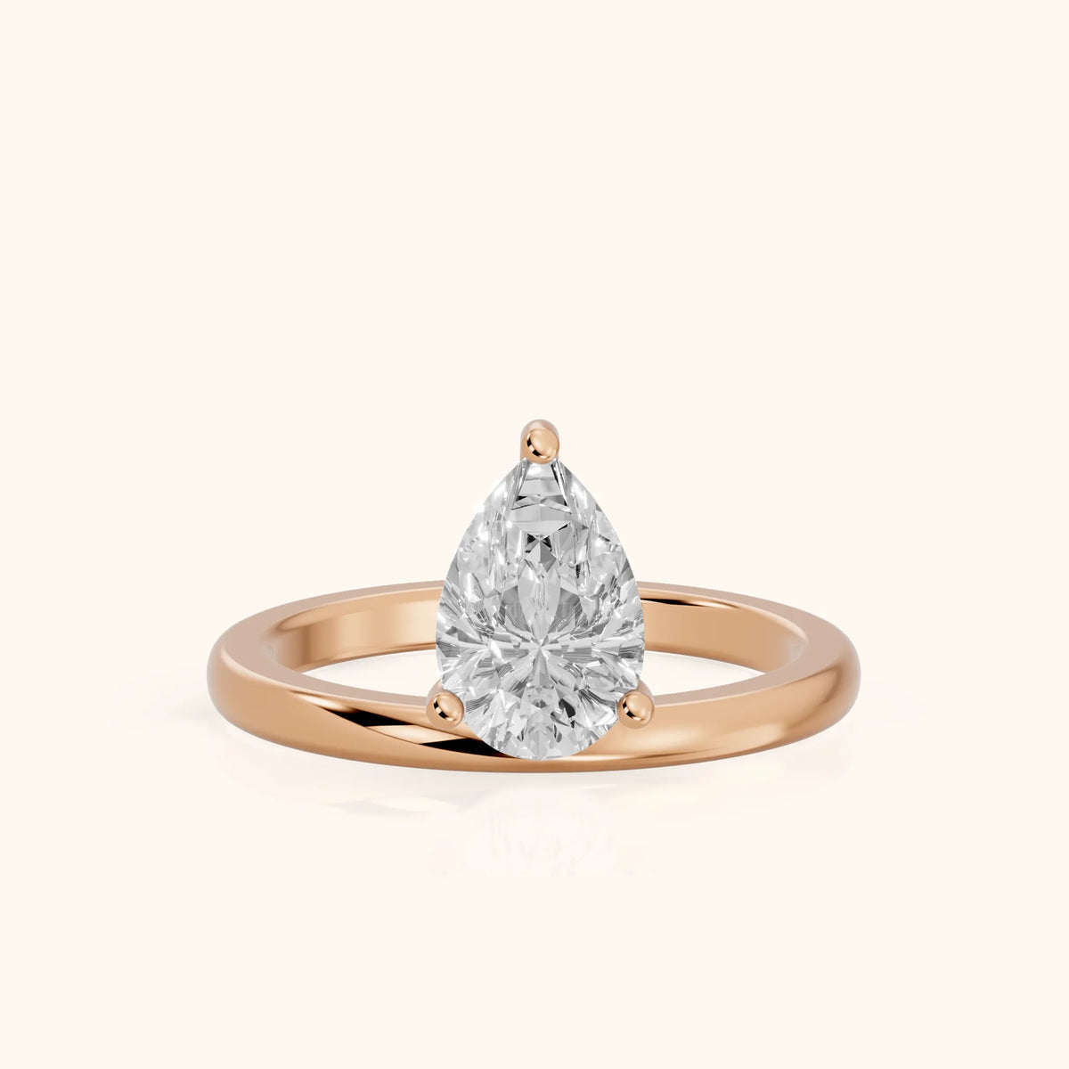 Maisie Four Prong Solitaire Pear Diamond Engagement Ring in Rose Gold - FrontView.webp