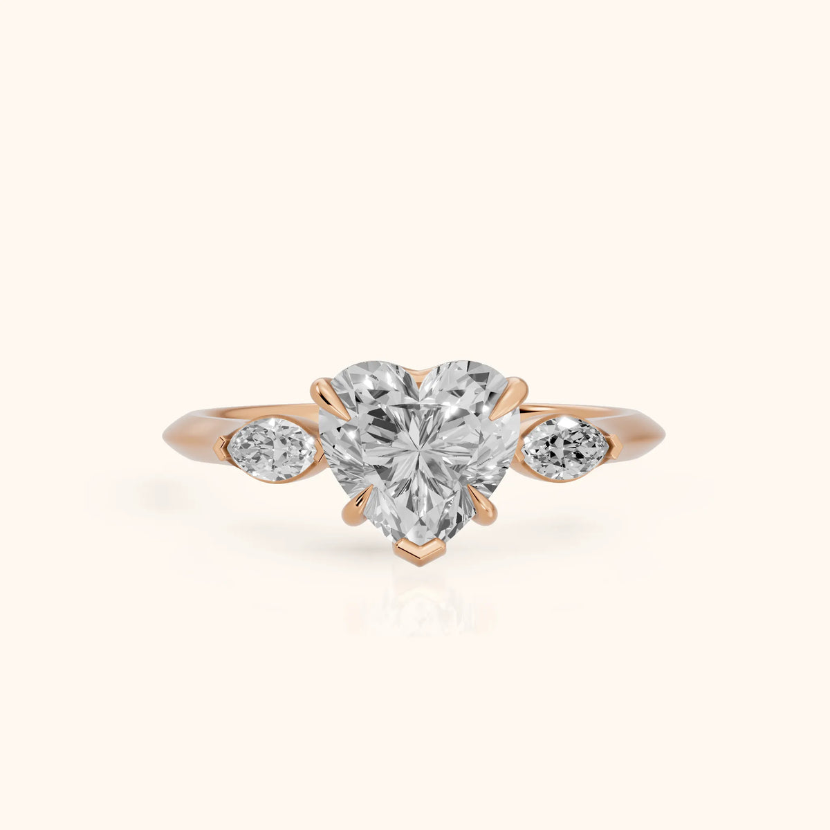 Lyra Three-Stone Heart Diamond Engagement Ring in Rose Gold - FrontView.webp