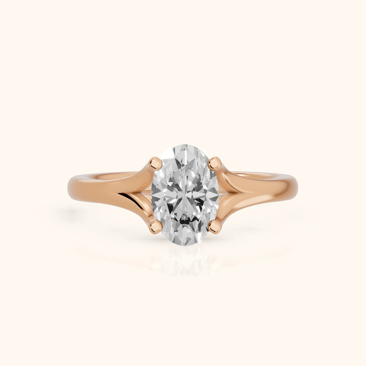 Nell Split Shank Solitaire Oval Diamond Engagement Ring in Rose Gold - FrontView.webp