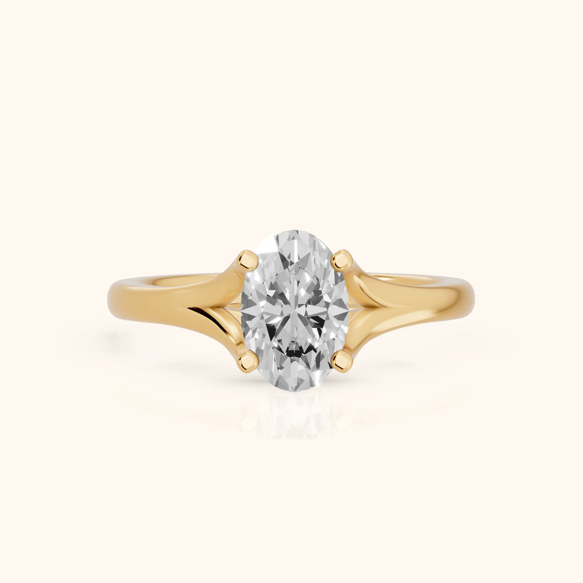 Nell Split Shank Solitaire Oval Diamond Engagement Ring in Yellow Gold - FrontView.webp