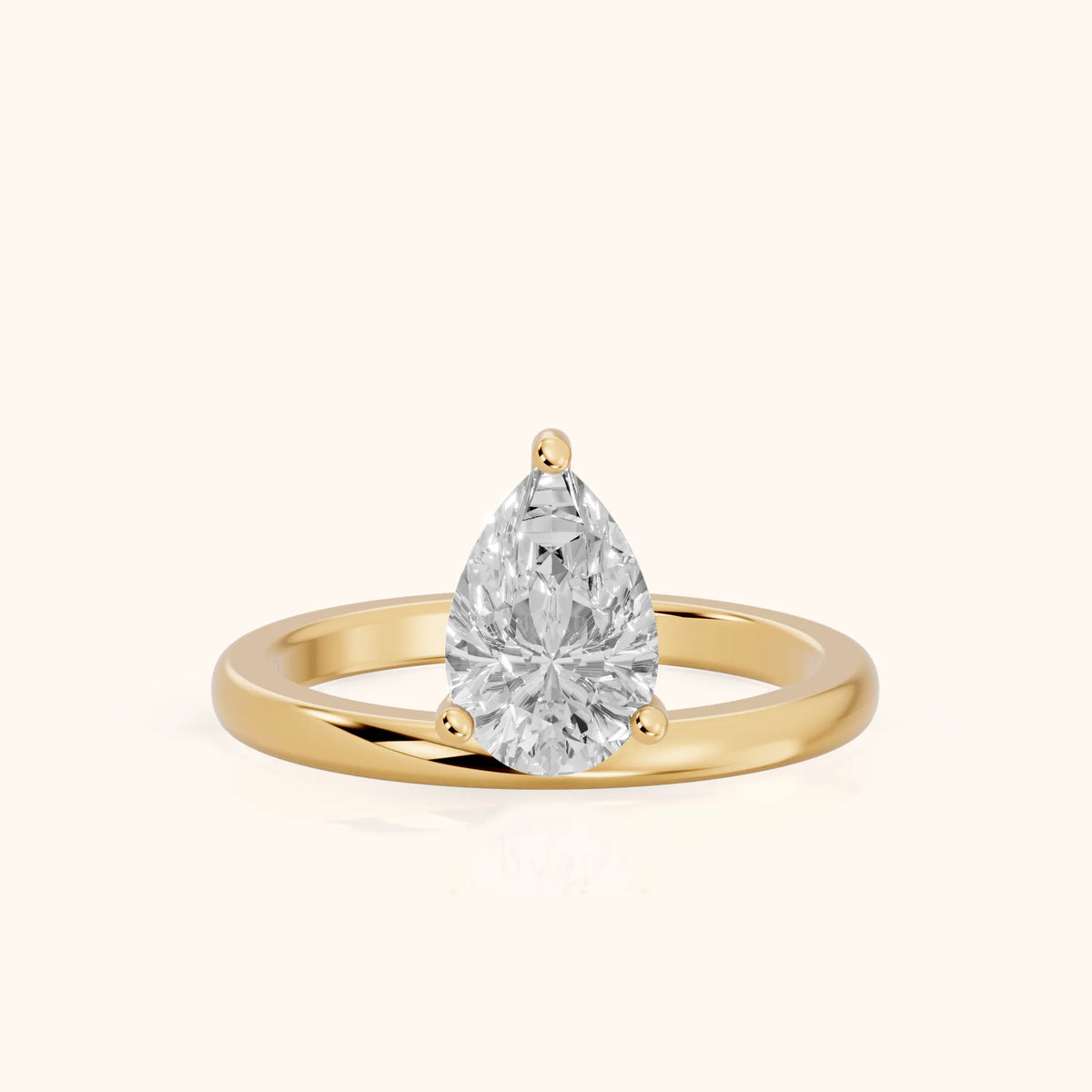 Maisie Four Prong Solitaire Pear Diamond Engagement Ring in Yellow Gold - FrontView.webp