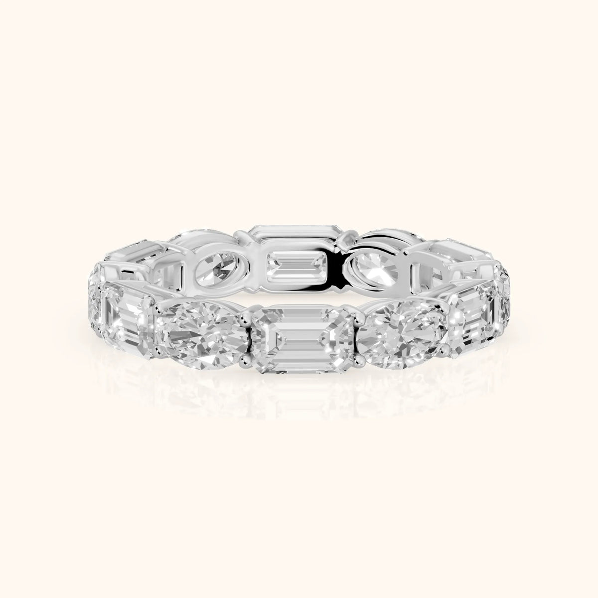 Hema Shared Prong Emerald & Oval Diamond Eternity Band in White Gold - FrontView