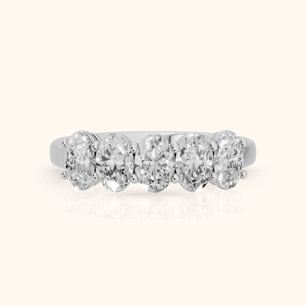 Estela Shared Prong Oval Diamond Wedding Band in Platinum - FrontView