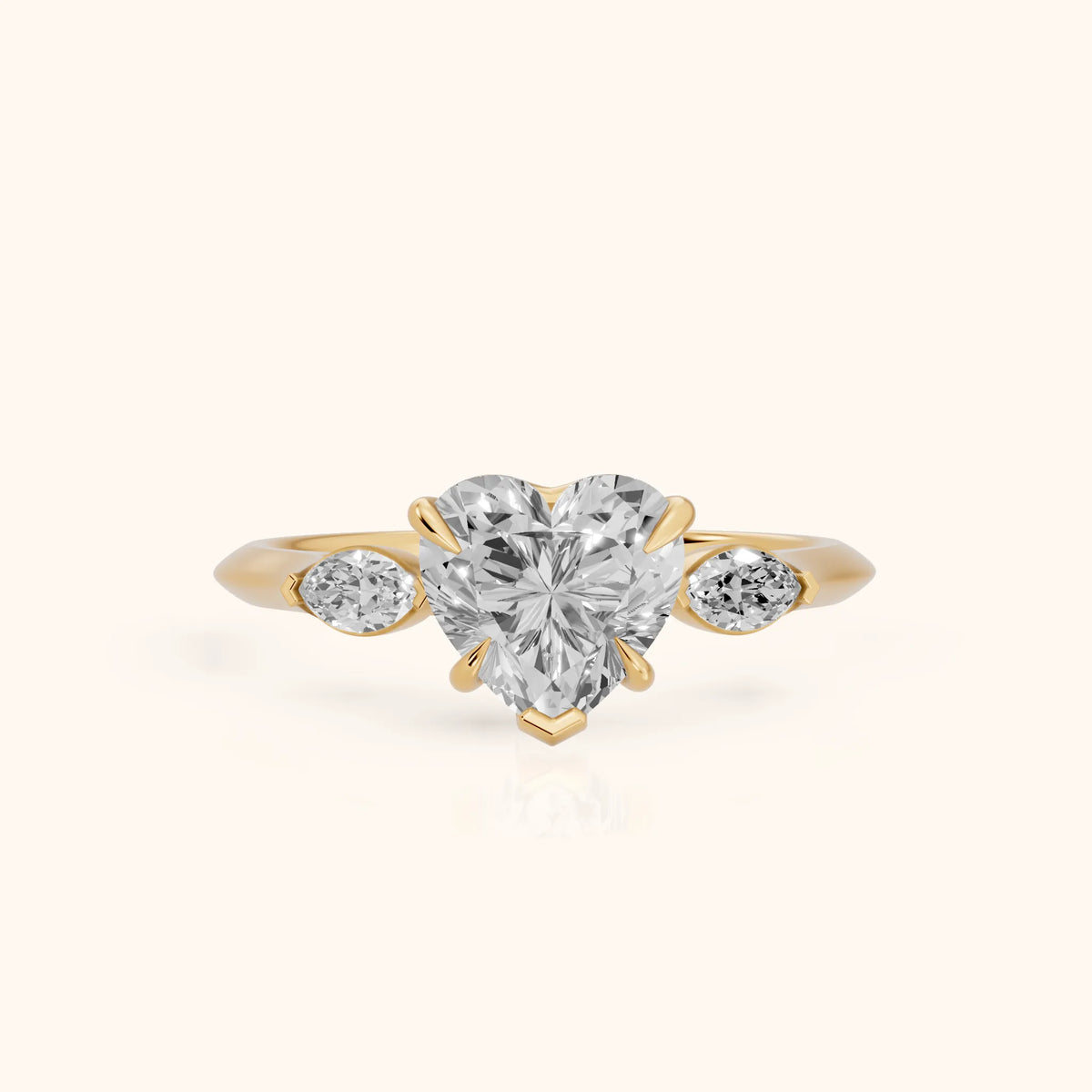 Lyra Three-Stone Heart Diamond Engagement Ring in Yellow Gold - FrontView.webp