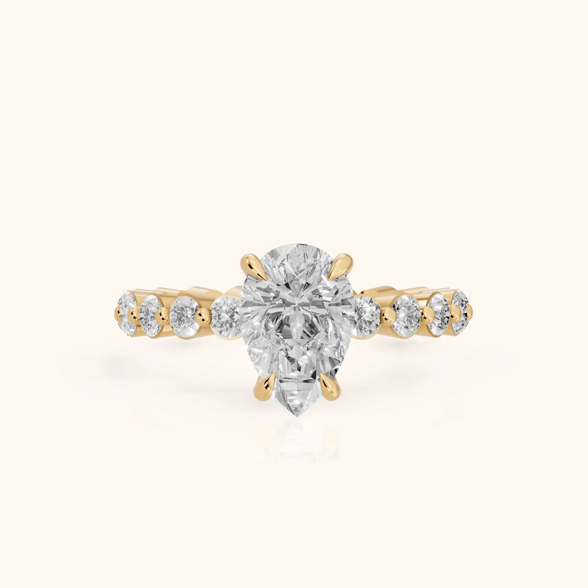 Piper Sidestone Pear Diamond Engagement Ring in Yellow Gold - FrontView.webp