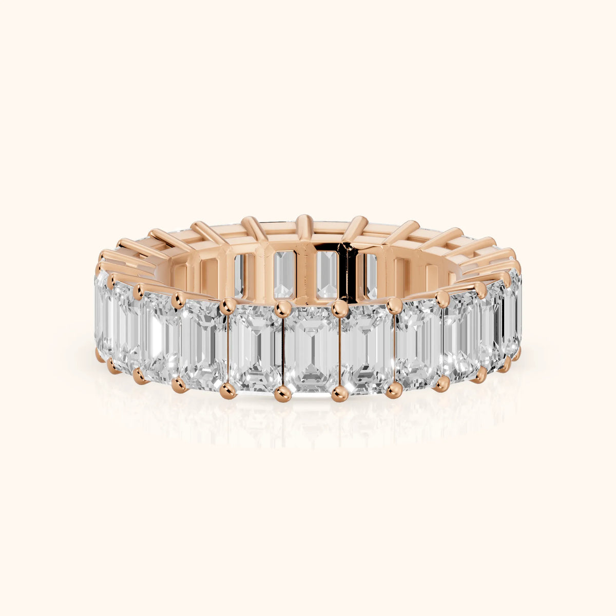 Callia Shared Prong Emerald Diamond Eternity Band in Rose Gold - FrontView