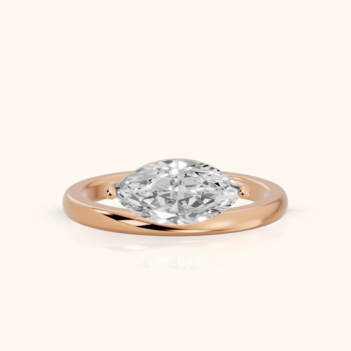 Maisie Four Prong Solitaire Marquise Diamond Engagement Ring in Rose Gold - FrontView.webp