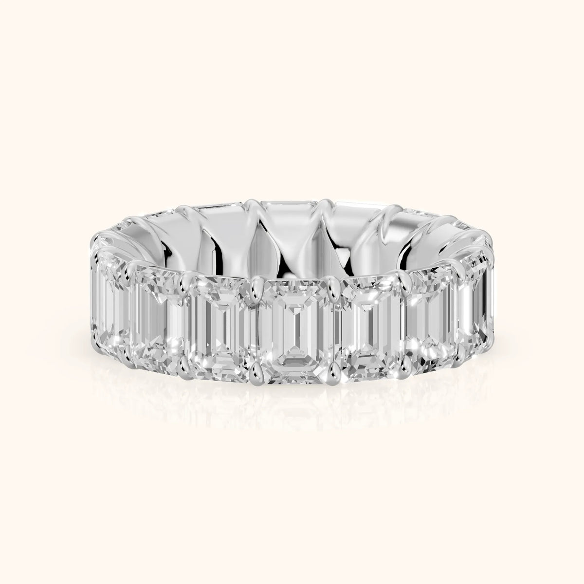 Zia Shared Prong Emerald Diamond Eternity Band in Platinum - FrontView