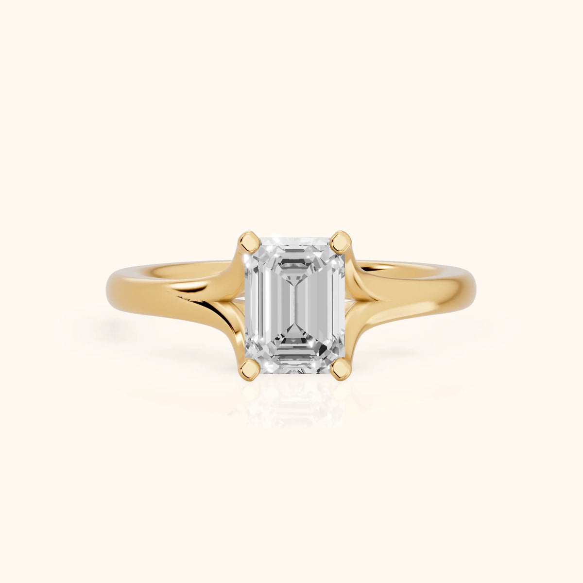 Nell Split Shank Solitaire Emerald Diamond Engagement Ring in Yellow Gold - FrontView.webp