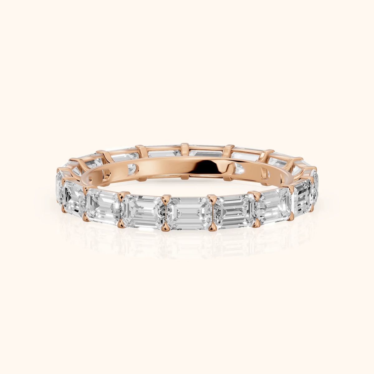 Ria East-West Emerald Diamond Eternity Band in Rose Gold - FrontView