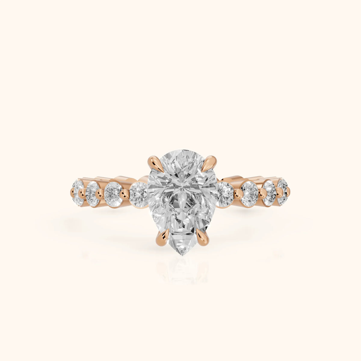 Piper Sidestone Pear Diamond Engagement Ring in Rose Gold - FrontView.webp