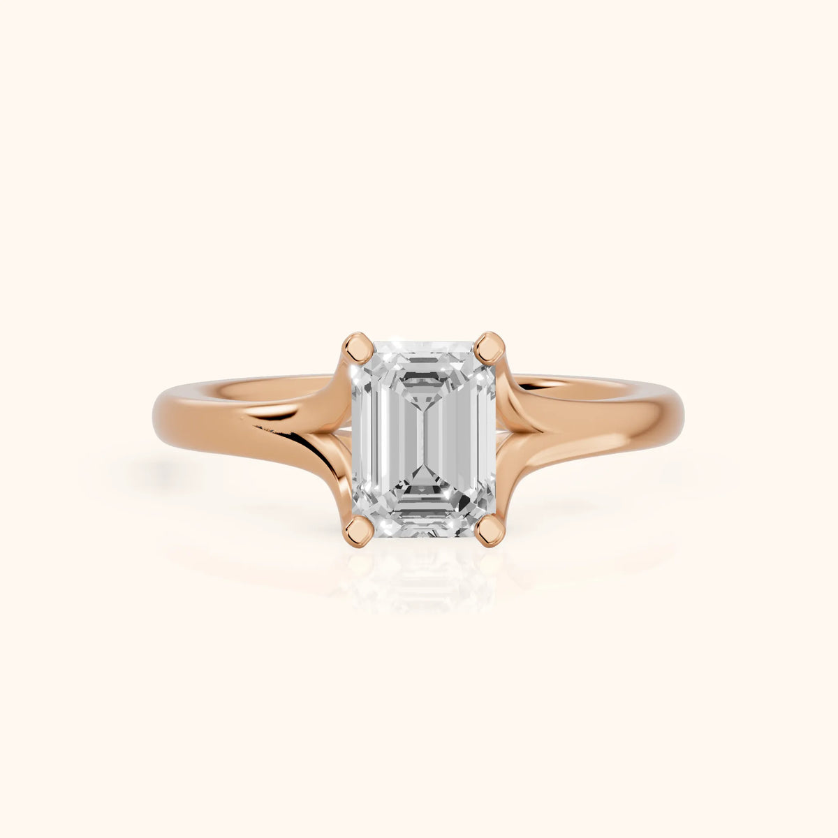 Nell Split Shank Solitaire Emerald Diamond Engagement Ring in Rose Gold - FrontView.webp