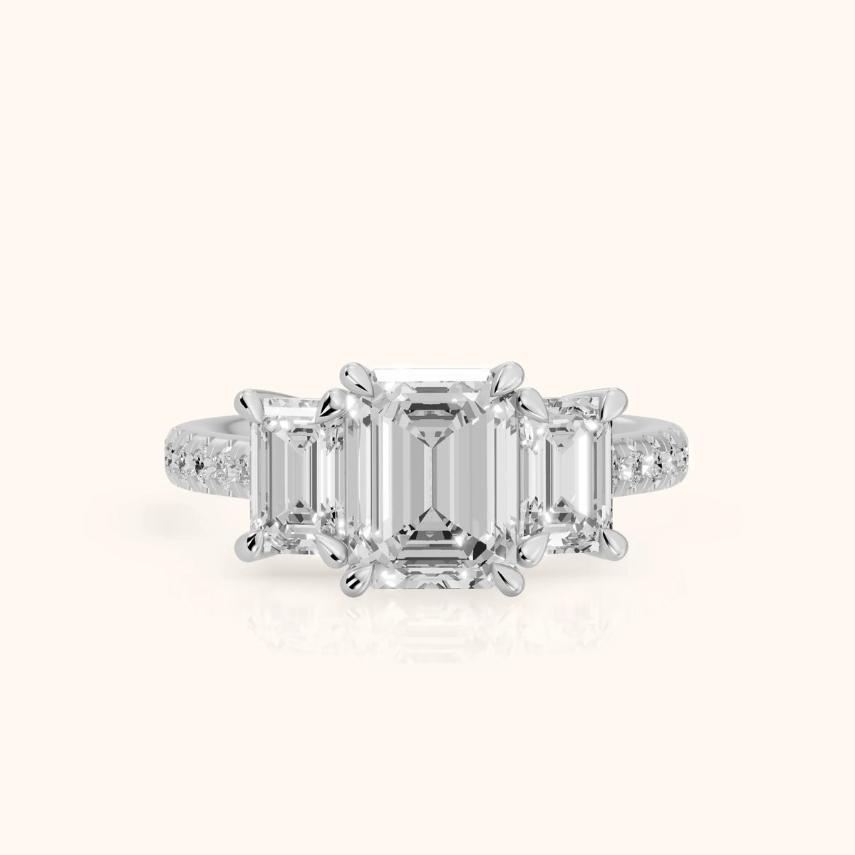 Gabrielle Three-Stone Pavé Emerald Diamond Engagement Ring in Silver - FrontView.webp