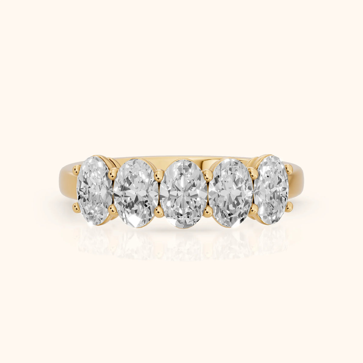 Estela Shared Prong Oval Diamond Wedding Band in Yellow Gold - FrontView