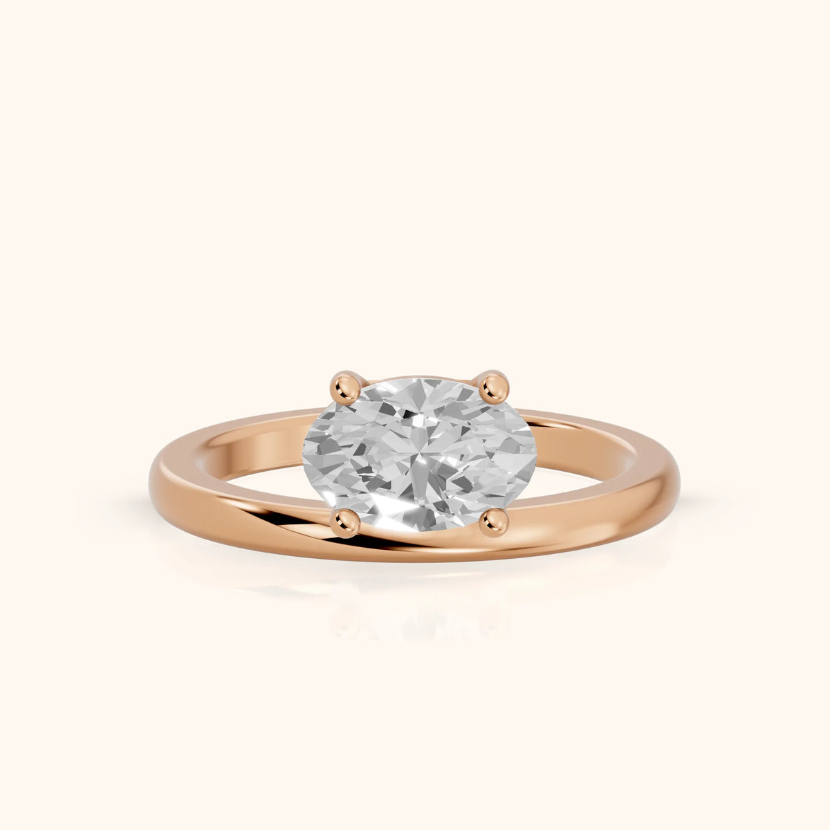 Maisie Four Prong Solitaire Oval Diamond Engagement Ring in Rose Gold - FrontView.webp