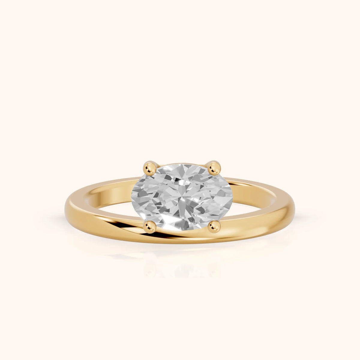 Maisie Four Prong Solitaire Oval Diamond Engagement Ring in Yellow Gold - FrontView.webp