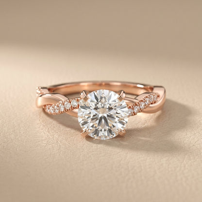 Round cut lab grown diamond twisted side stone engagement ring in rose gold