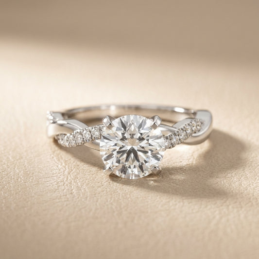 Round cut lab grown diamond twisted side stone engagement ring in white gold