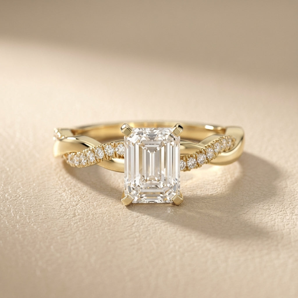 Emerald Cut Lab Grown Diamond Twisted Side Stone Engagement Ring in Yellow Gold