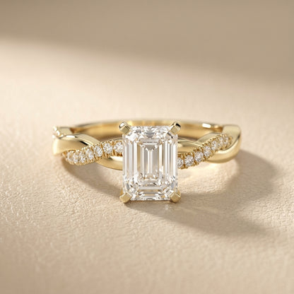 Emerald Cut Lab Grown Diamond Twisted Side Stone Engagement Ring in Yellow Gold