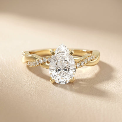 Pear Cut Lab Grown Diamond Twisted Engagement Ring in Yellow Gold