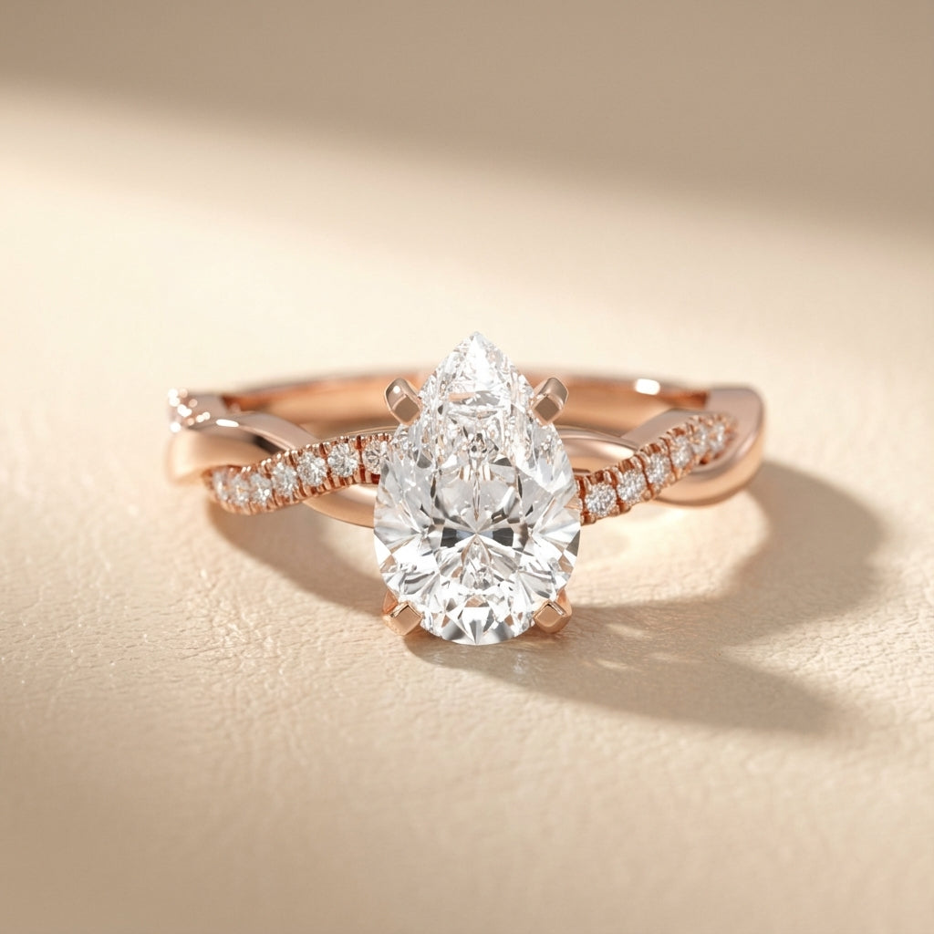 Pear Cut Lab Grown Diamond Twisted Engagement Ring in Rose Gold