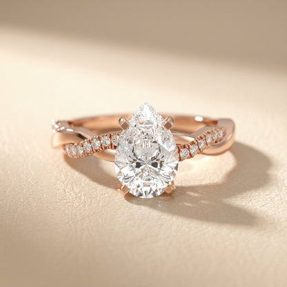 Pear Cut Lab Grown Diamond Twisted Engagement Ring in Rose Gold