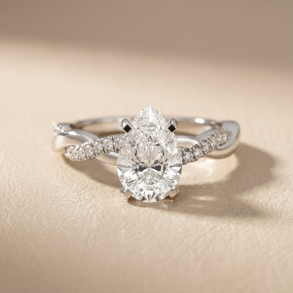 Pear Cut Lab Grown Diamond Twisted Engagement Ring in White Gold