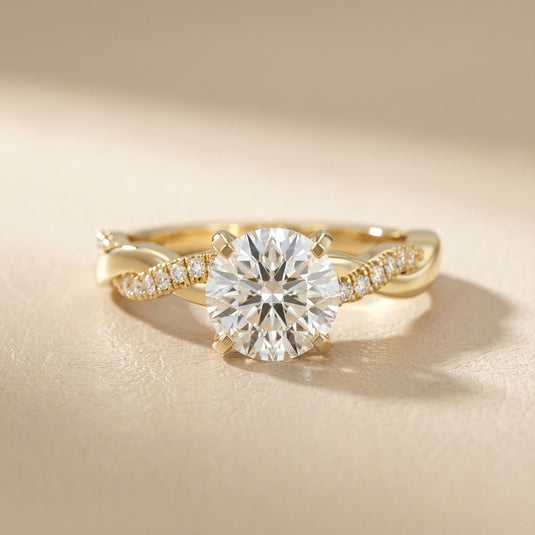 Round cut lab grown diamond twisted side stone engagement ring in yellow gold