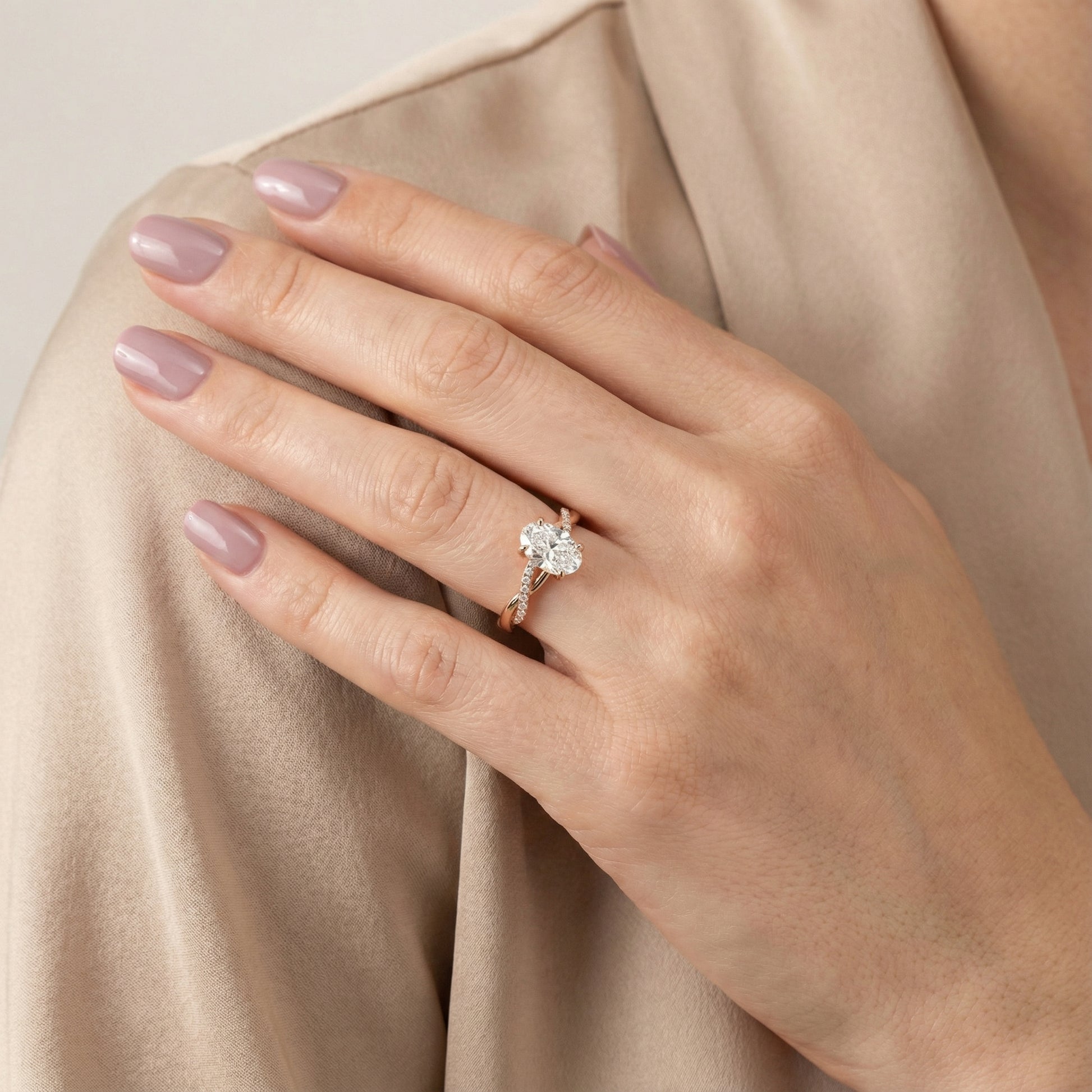 Oval Cut Lab Grown Diamond Twisted Side Stone Engagement Ring in Rose Gold