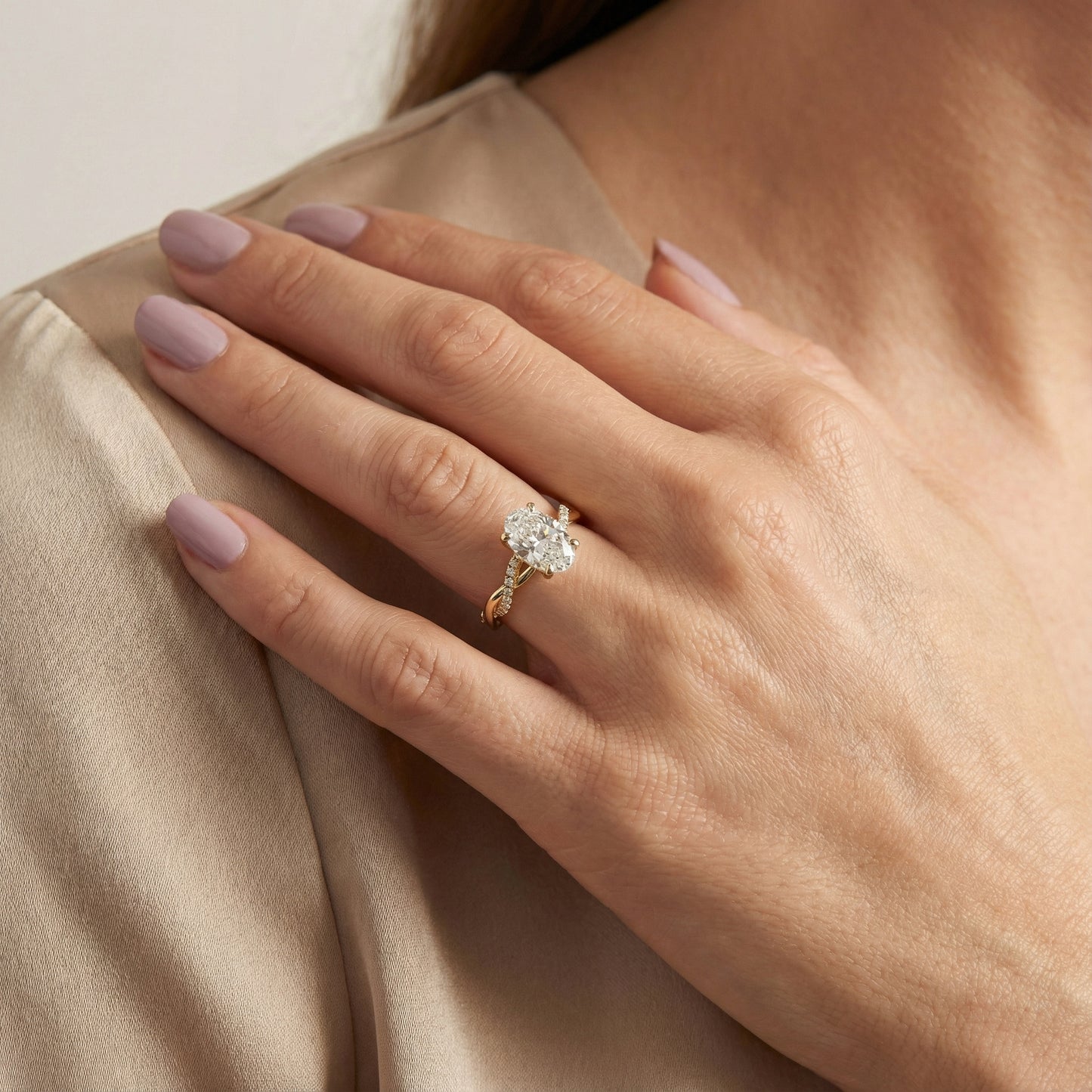 Oval Cut Lab Grown Diamond Twisted Side Stone Engagement Ring in Yellow Gold